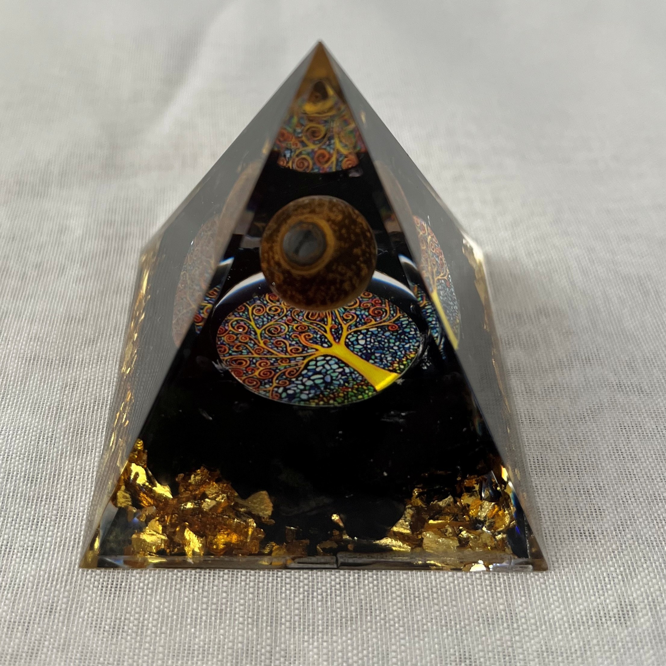 5cm orgonite pyramid tiger eye 5cm orgonite pyramid tiger eye